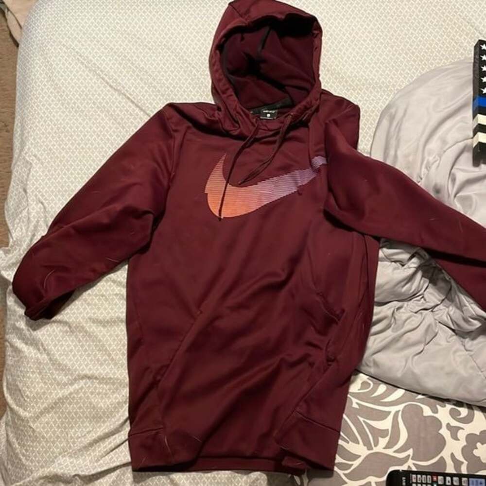 Nike sweatshirt large used a few times! Maroon ish red w/Nike swoosh!